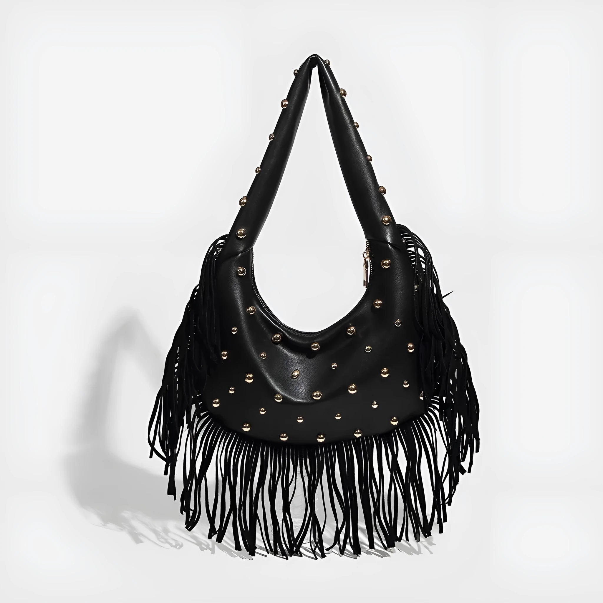 Retro black shoulder handbag with decorative tassel and internal mobile phone pocket
