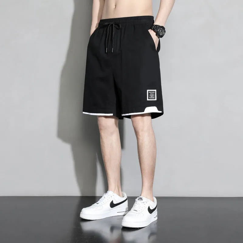 Cotton shorts for boys in black, khaki or white colours with mid waist design and extended sizing options