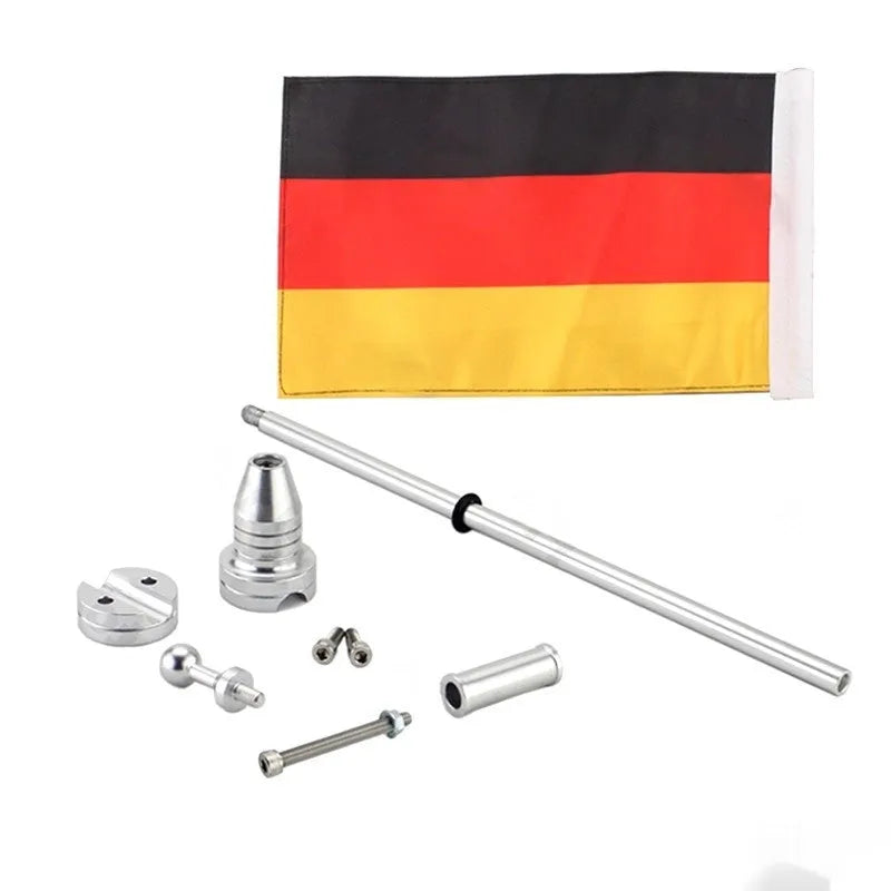 Metal motorcycle flagpole for mounting on luggage rack, shown in black and silver finish options.