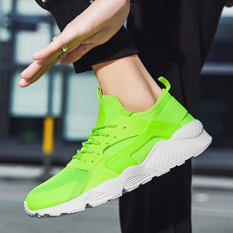 Men's low top casual shoes with cross strap design and mesh construction in fluorescent colours