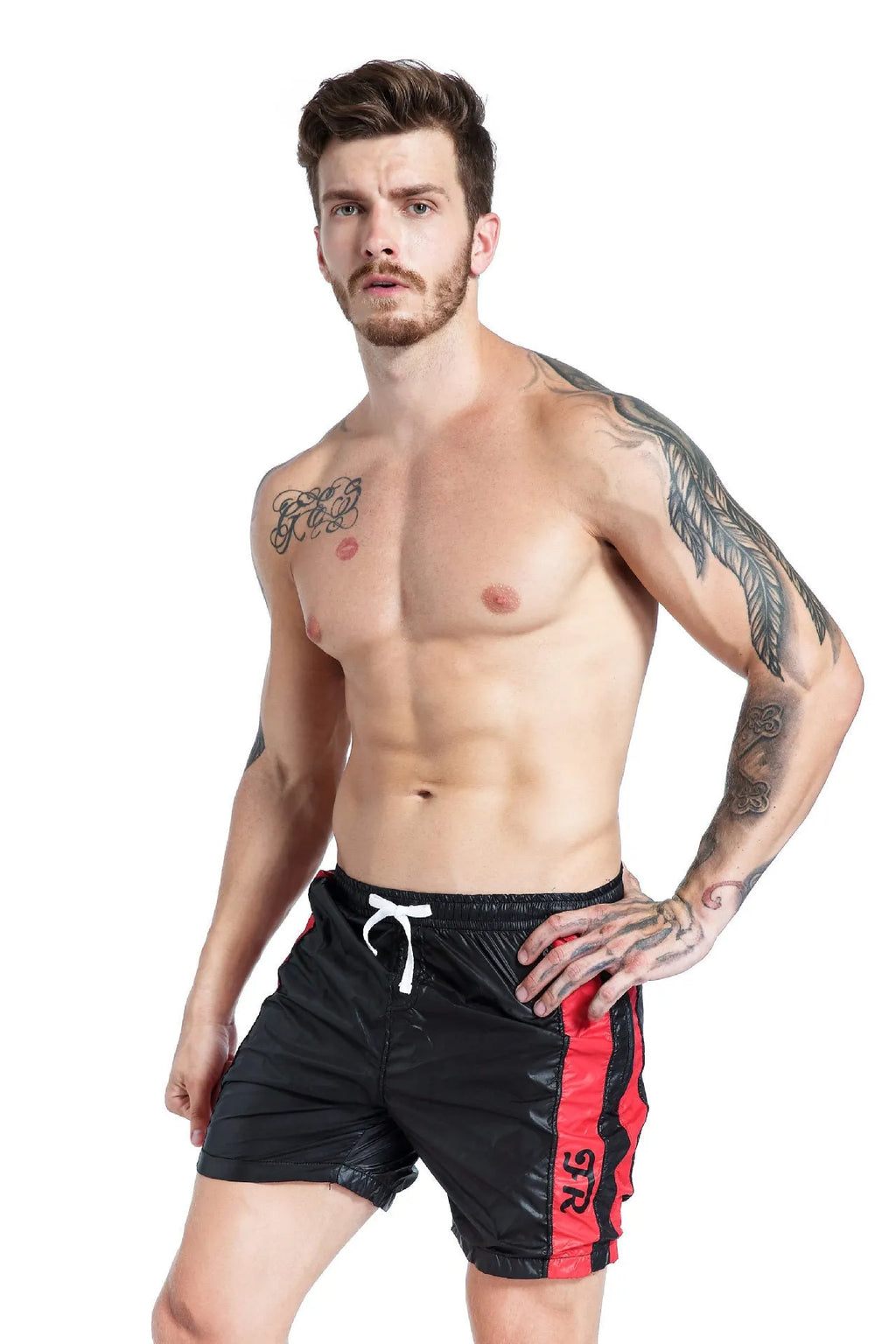 Men's blue slim fit lace-up sports shorts made from stretch polyester with built-in padding.