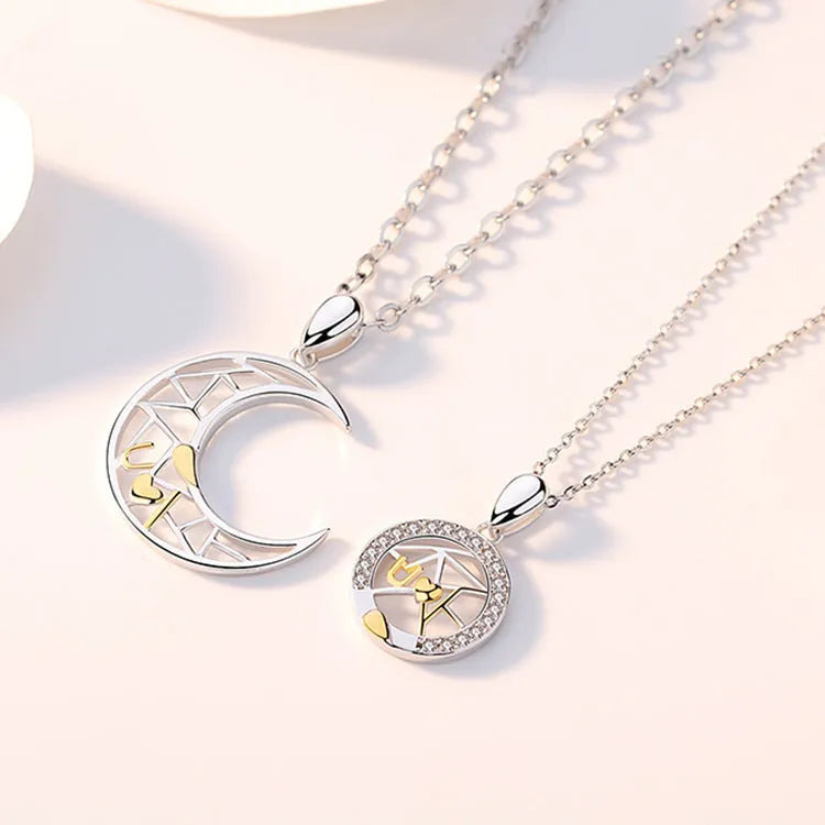 Sun and moon tooth couple necklace with copper pendant and cross chain.