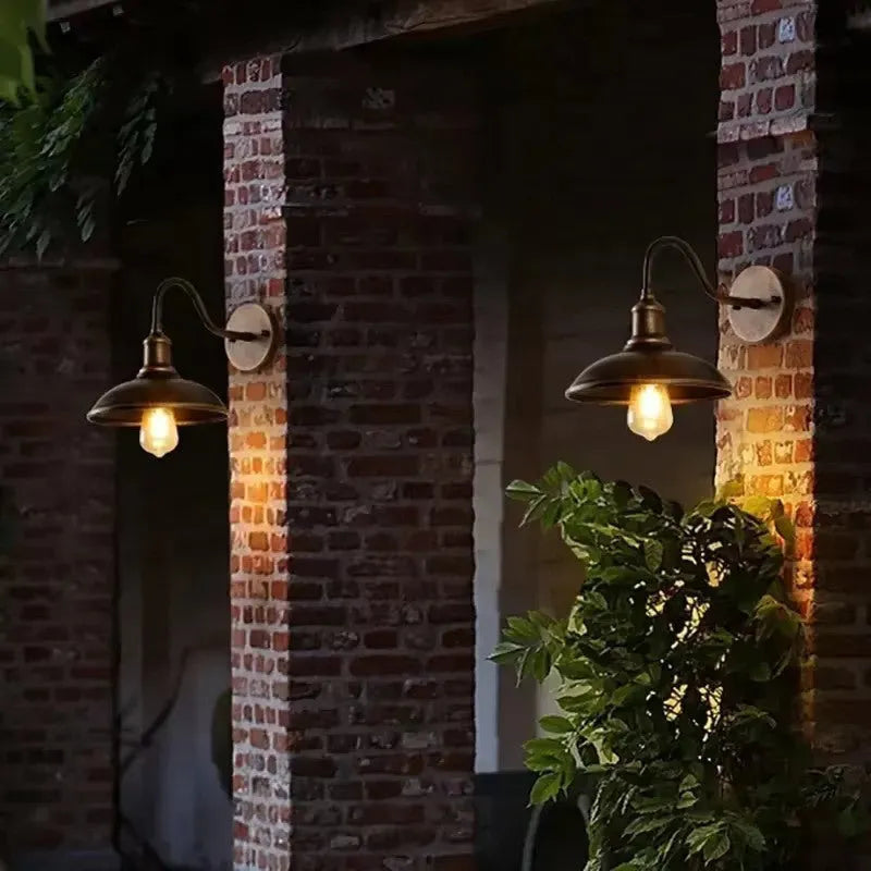 Retro-style metal courtyard wall lamp shown in silver and copper finishes with right-angle and bevel-angle bracket options.