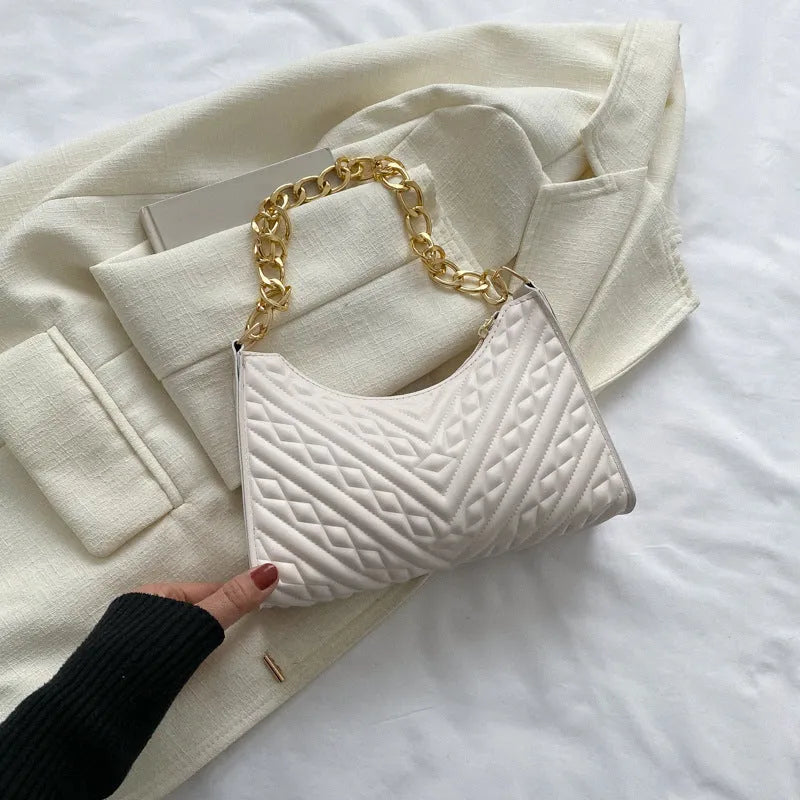Brown pleated chain baguette shoulder bag showing vertical square shape and adjustable 50cm strap