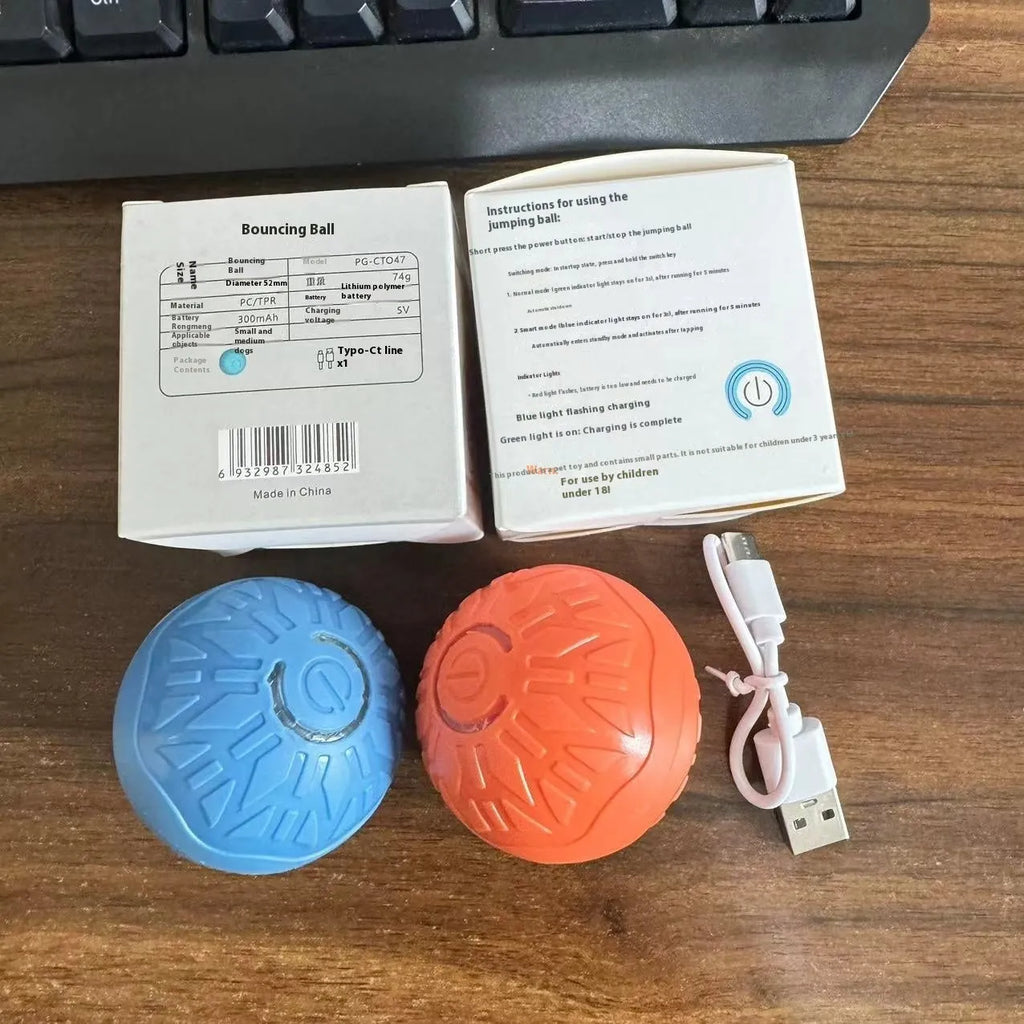 Blue electric jumping ball for dogs with silicone shell on a wooden floor
