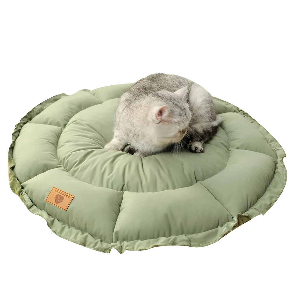Grey and green reversible donut-shaped cat bed with plush fabric and non-slip base