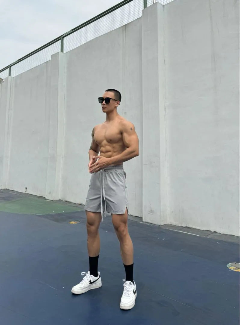Men's ice silk quick-drying shorts in casual double-layer design