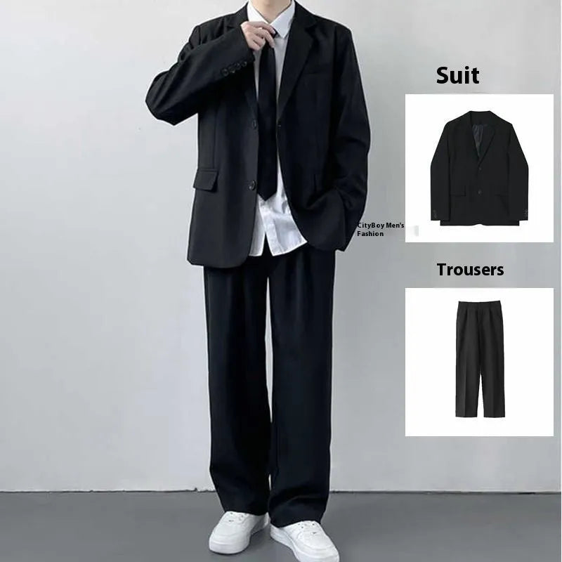 Plus size man modelling a loose fit black suit jacket and trousers with a white shirt and tie.