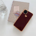 Simple solid colour TPU back cover case for iPhone on a table, shown in blue.