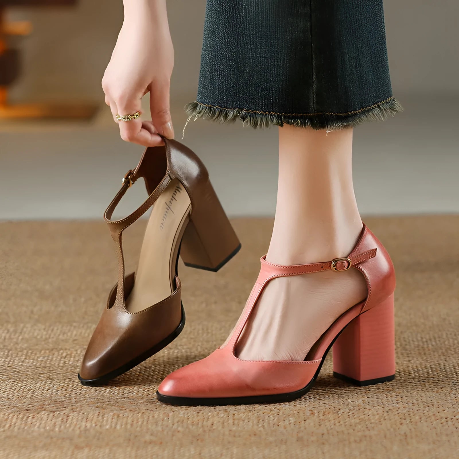 Women's dark brown retro pointed-toe Mary Jane shoes with a buckle fastening on the vamp.