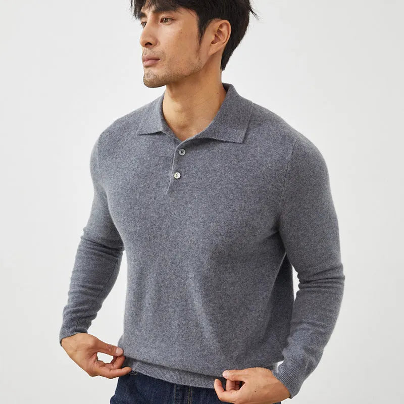 Man wearing a sapphire blue cashmere short sleeve pullover sweater with a polo collar.