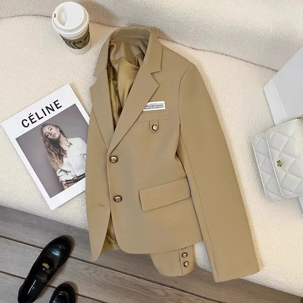 Black women's loose short suit coat with pockets and regular long sleeves