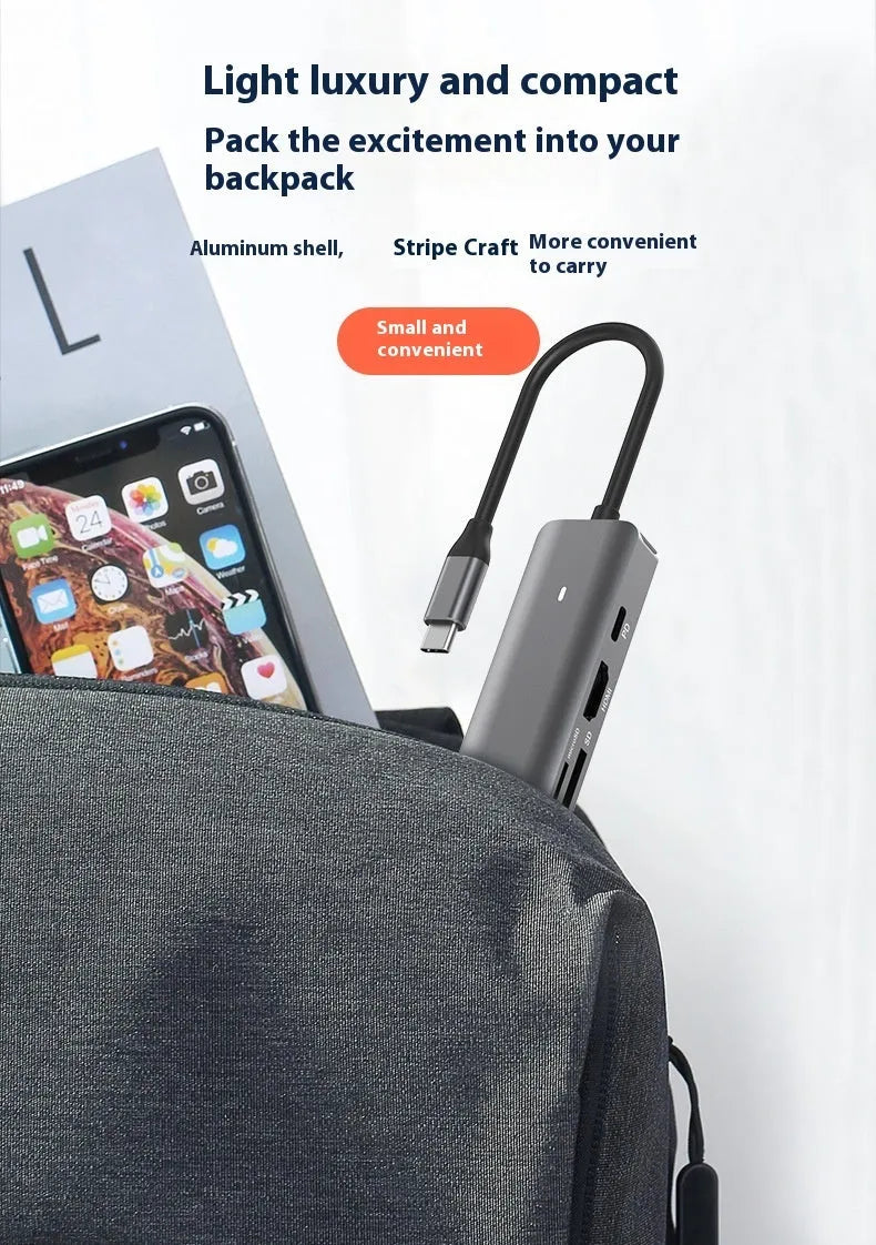LQT-LH07 7-in-1 USB C hub with SD and TF card reader slots for laptop connectivity.