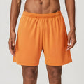 Man's quick-drying athletic shorts in khaki colour, showing double-layer construction and mid-waist fit.