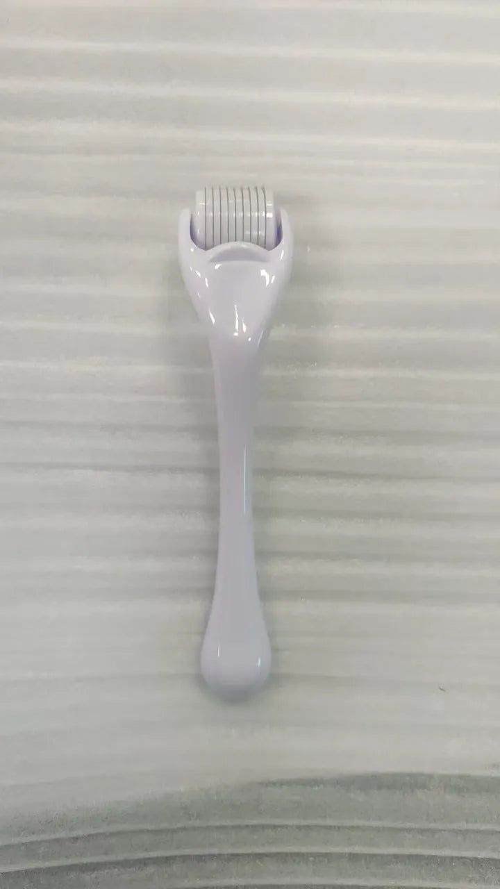 540 micro needle derma roller showing handle and needle wheel in a selected colour
