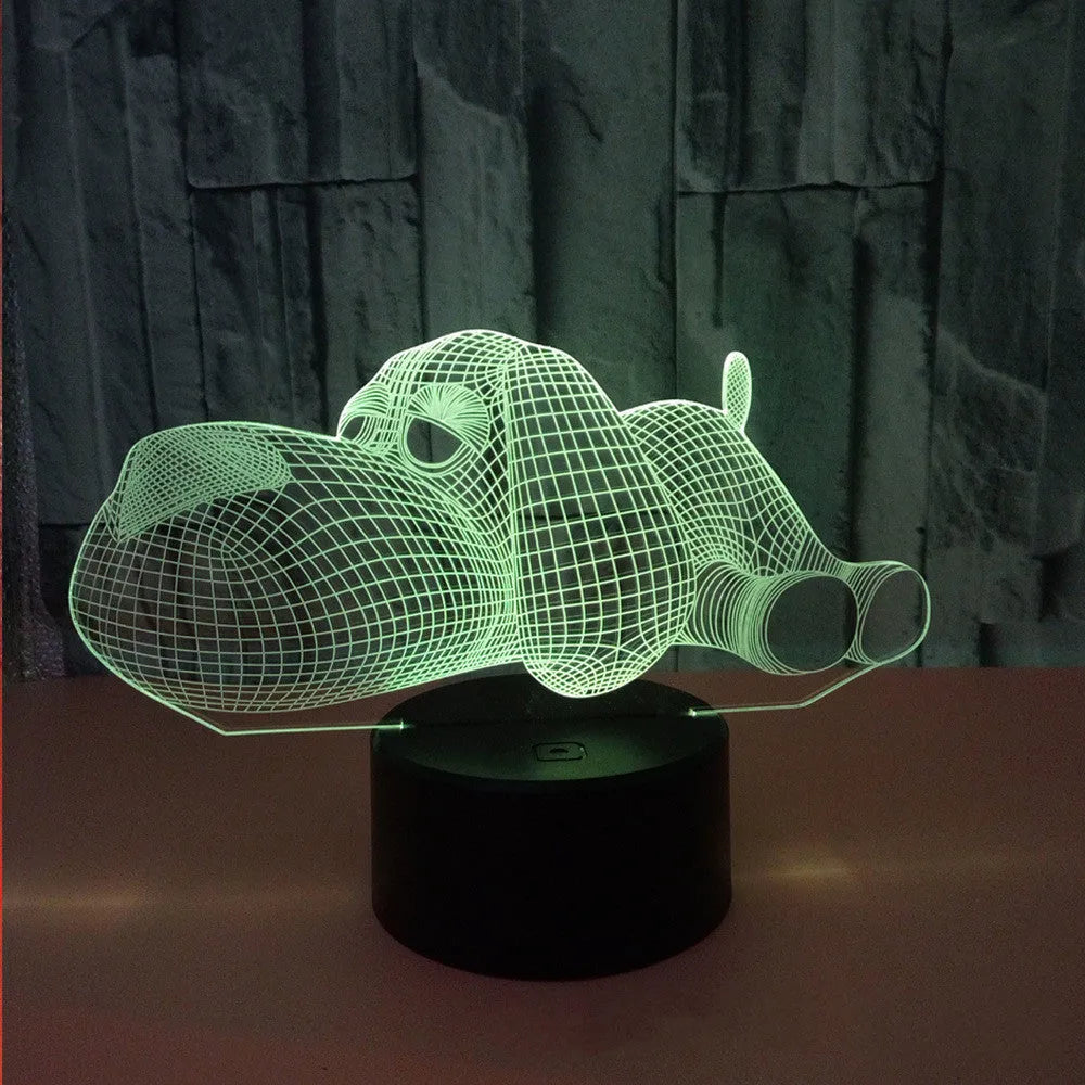 Dog-shaped desktop lamp glowing in blue with touch button and USB power cable