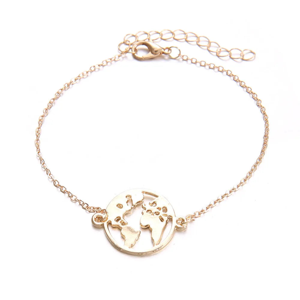 Three bohemian-style alloy bracelets with heart-shaped aircraft map charms on a white background.