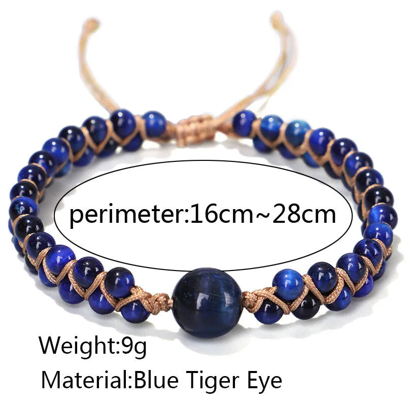 Handwoven geometric pull bracelet made from blue Tigereye stone on a wrist.