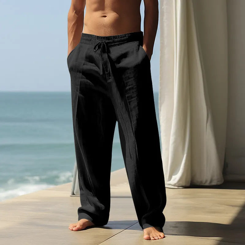 Men's loose fit cotton casual trousers in solid colours showing relaxed silhouette