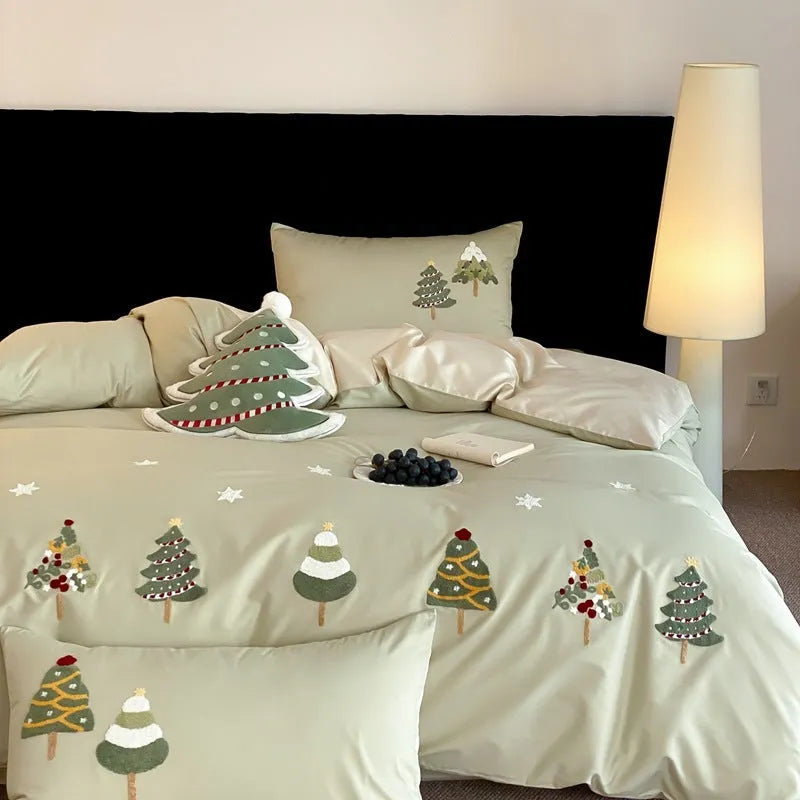 Cotton four-piece bedding set with embroidered Christmas tree towel design on duvet cover