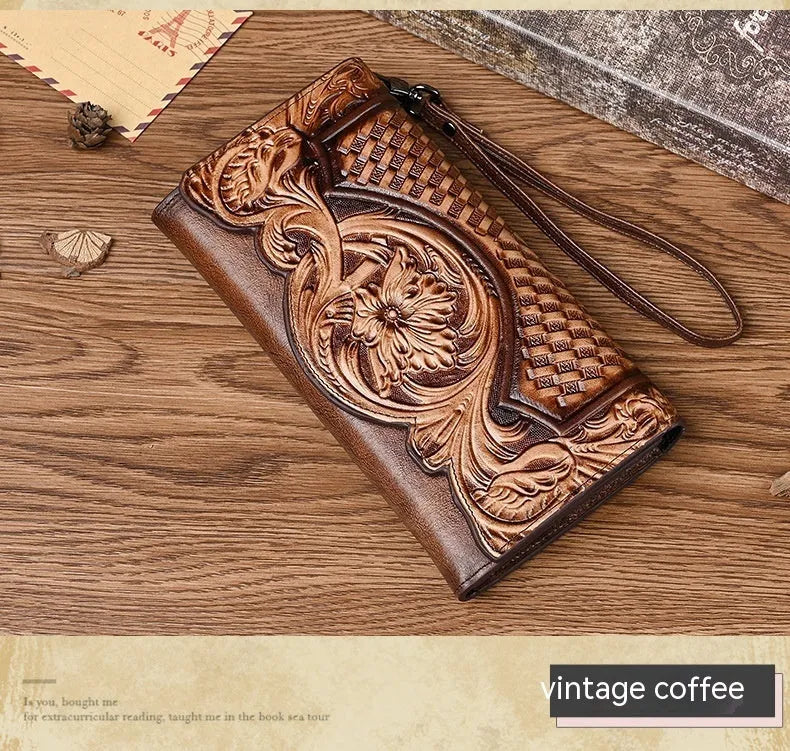 Chinese style embossed women's tri-fold wallet in genuine cowhide leather showing floral pattern detail