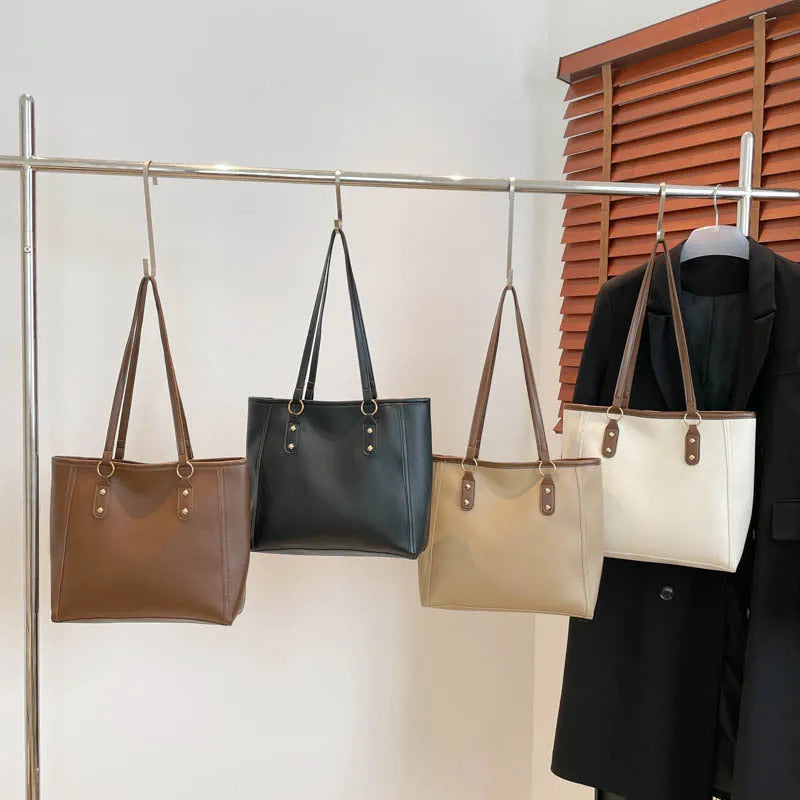 Korean style shoulder underarm bag in black PU leather with horizontal square shape and sandwich pockets