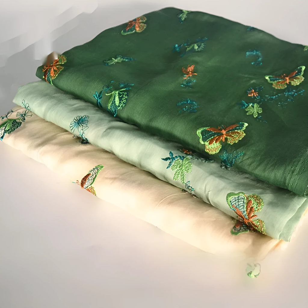 Pure ramie fabric swatch showing beige, grass green, and dark green colour options for traditional garment sewing