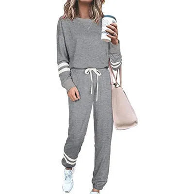 Women's plus size casual suit set in loose fit with long sleeves, shown in a solid colour.