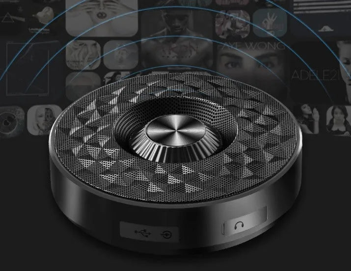 Mini portable Bluetooth speaker in black, orange, and silvery white colours with wireless connectivity