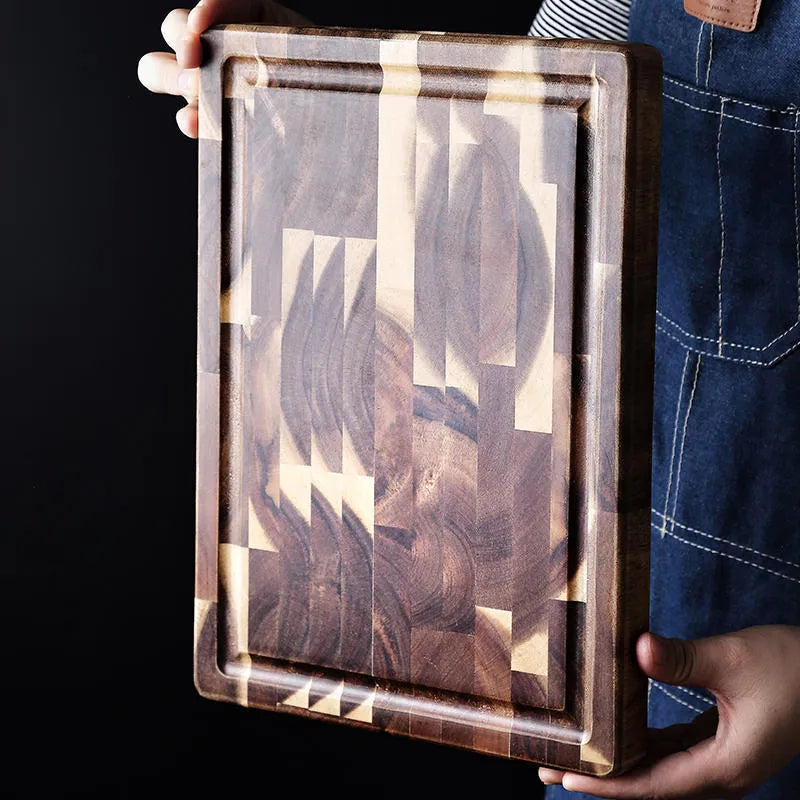 Brown acacia wood parquet cutting board with 3cm thickness on kitchen counter