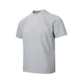 Man wearing a black loose-fit short sleeve top with visible air layer stitching texture.