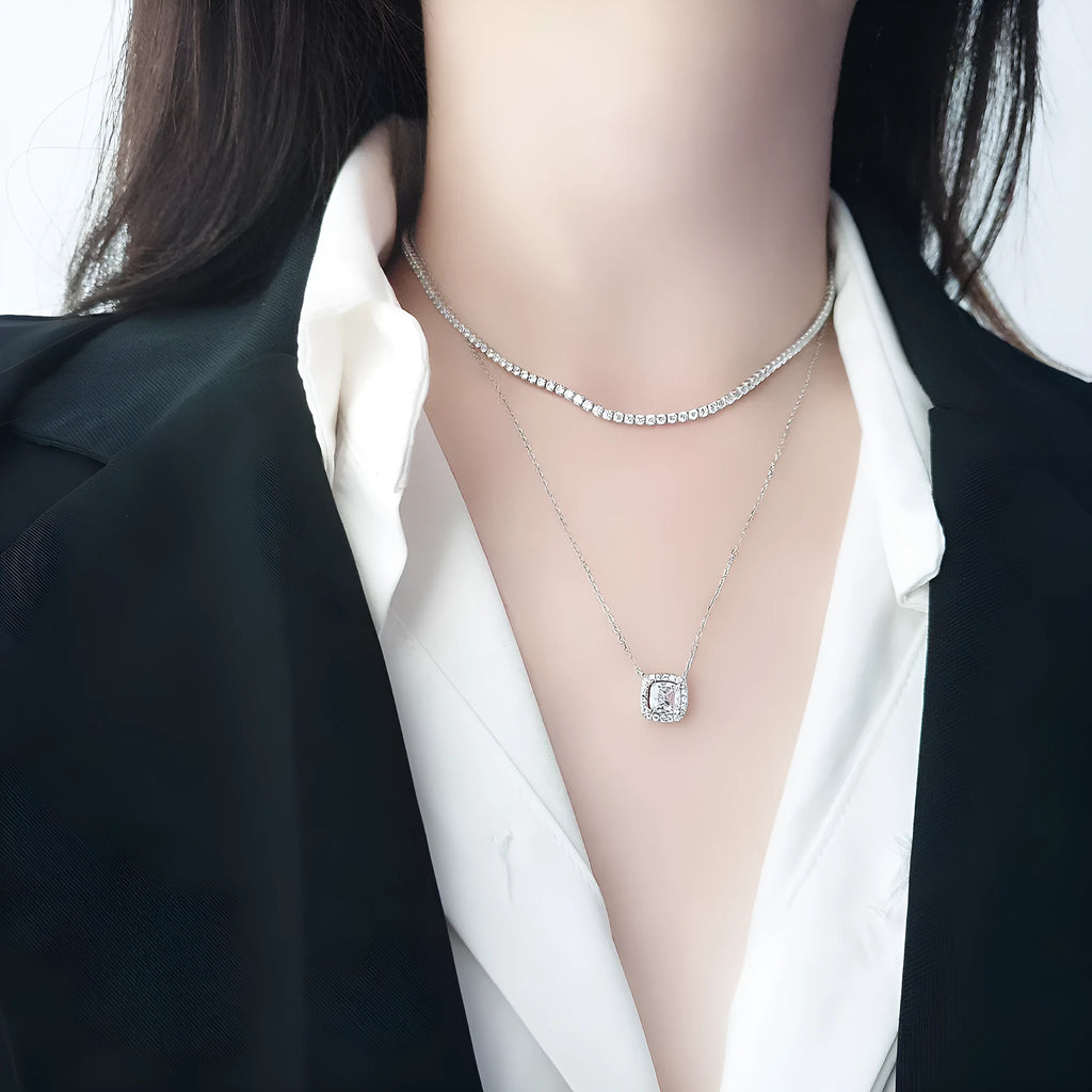 Women's sterling silver necklace with round pendant, diamond treatment finish