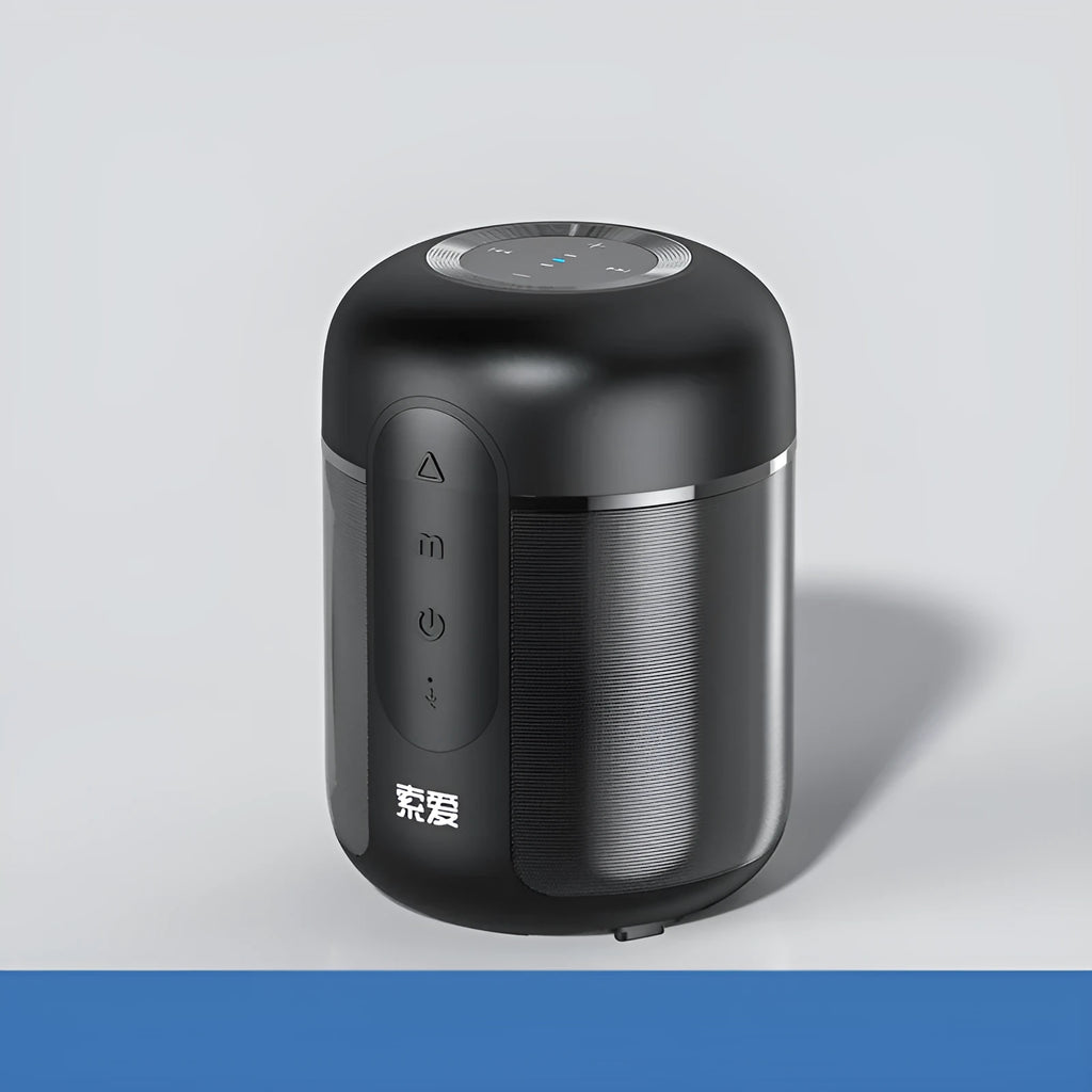 Compact black portable Bluetooth speaker showing front speaker grille and control buttons