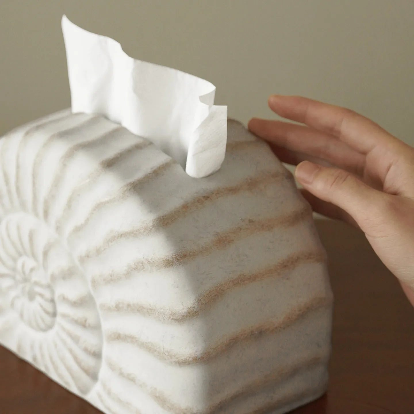Modern minimalist resin tissue box holder in a conch ramble colour and pattern.