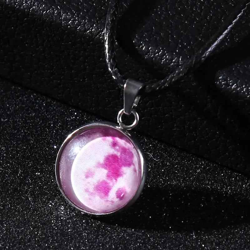 Alloy necklace with luminous glass pendant showing Christmas moon night sky and constellation design.