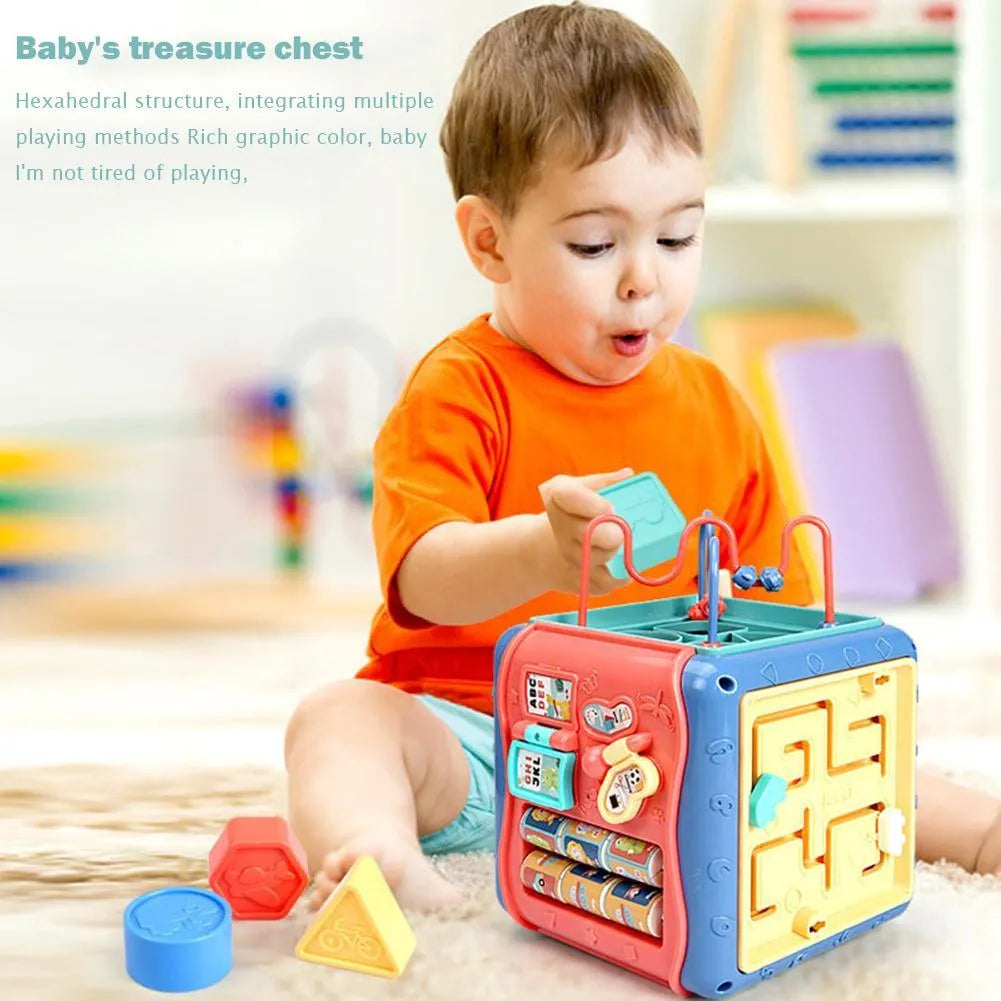 Colourful baby educational toy cube with six different activity sides including bead maze and gears.