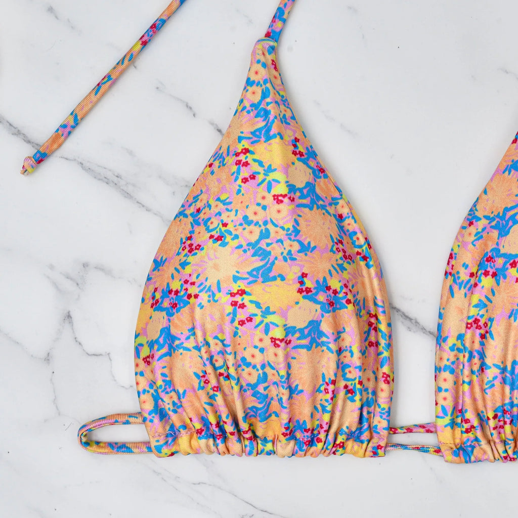 Lace-up bikini swimsuit with backless design and split style briefs in picture colour