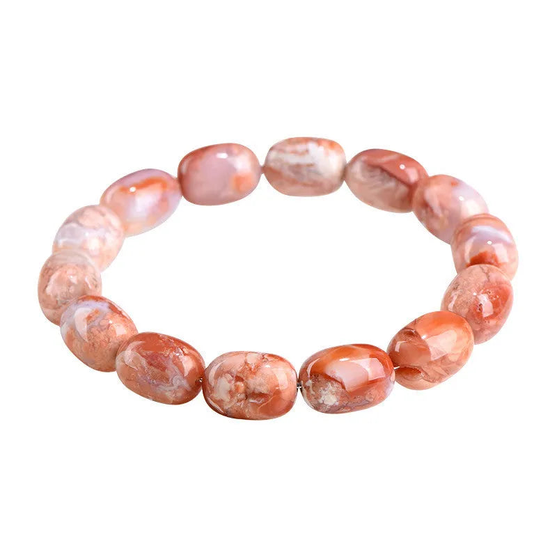 Natural cherry agate bracelet with barrel-shaped beads showing geometric design and Ruyi patterns