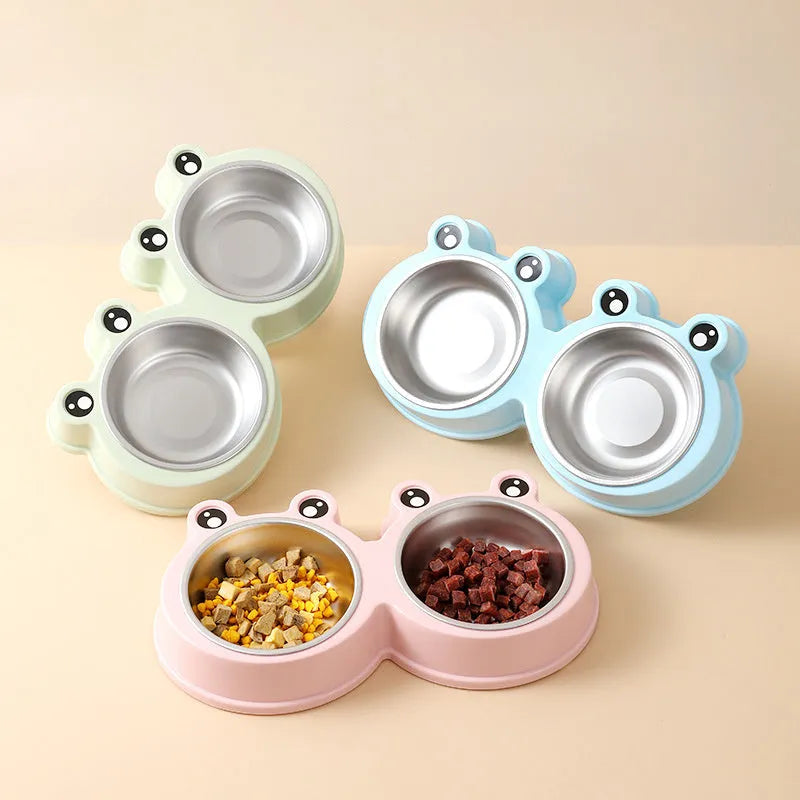 A stainless steel pet bowl with two compartments for water and food, shown in blue.