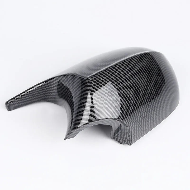 Pair of black and carbon pattern ABS plastic rearview mirror shells for BMW 3 Series E90.