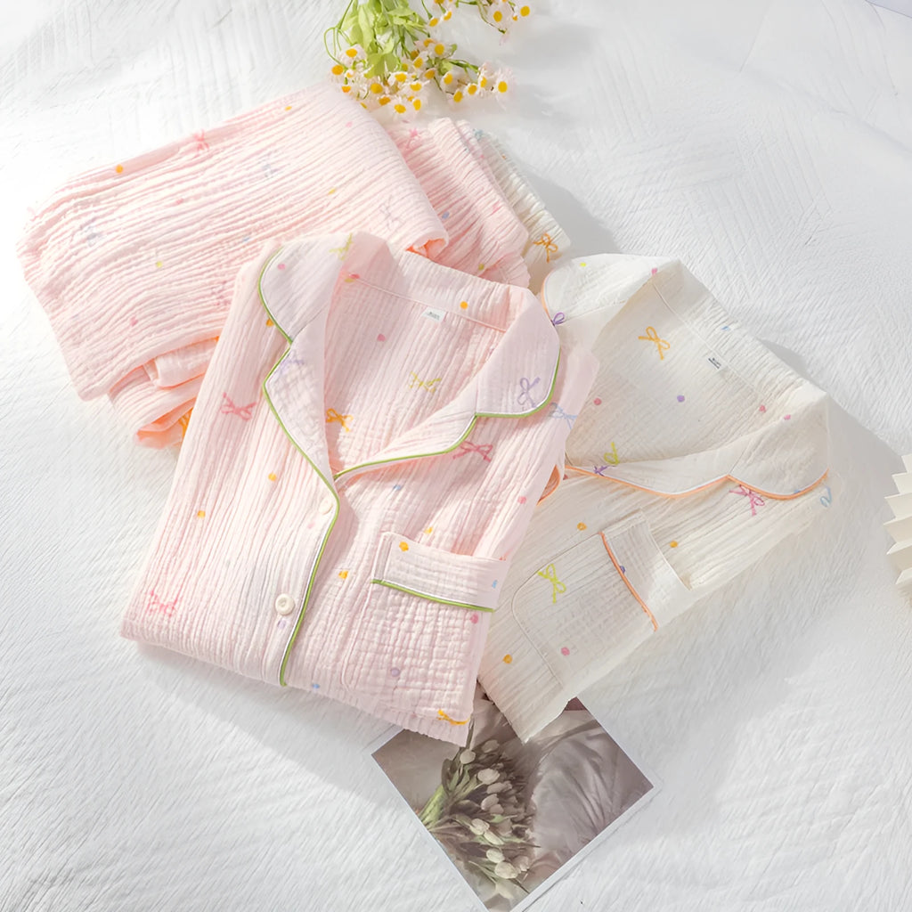Women's cotton pajama set with long sleeves in lightweight crepe fabric, shown in pink colour