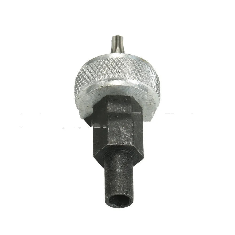 Close-up of an ignition module wrench tool with aluminium knurled knobs on a carbon steel handle.