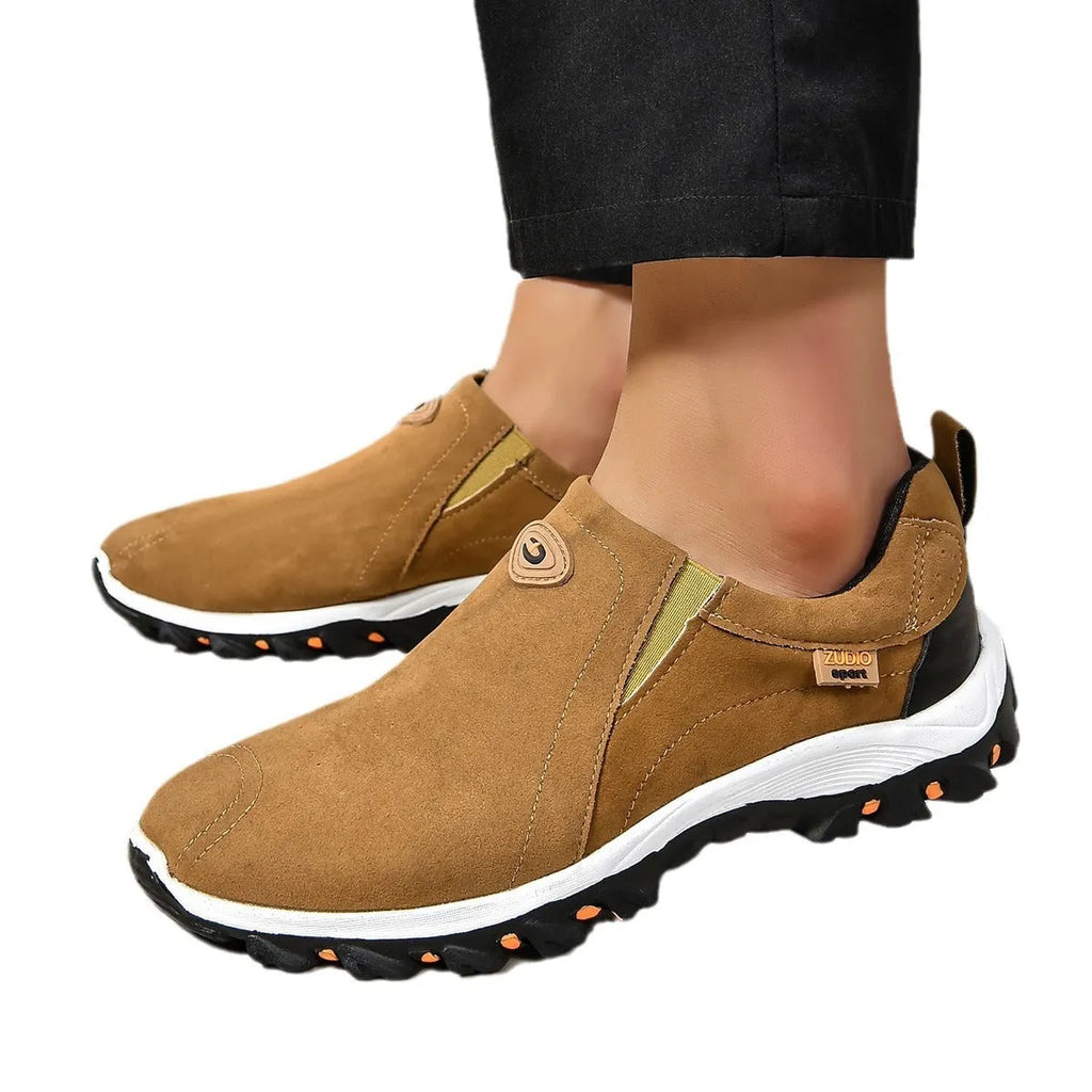 Men's grey PU slip-on overshoes with a round toe and rubber sole, shown on a foot.