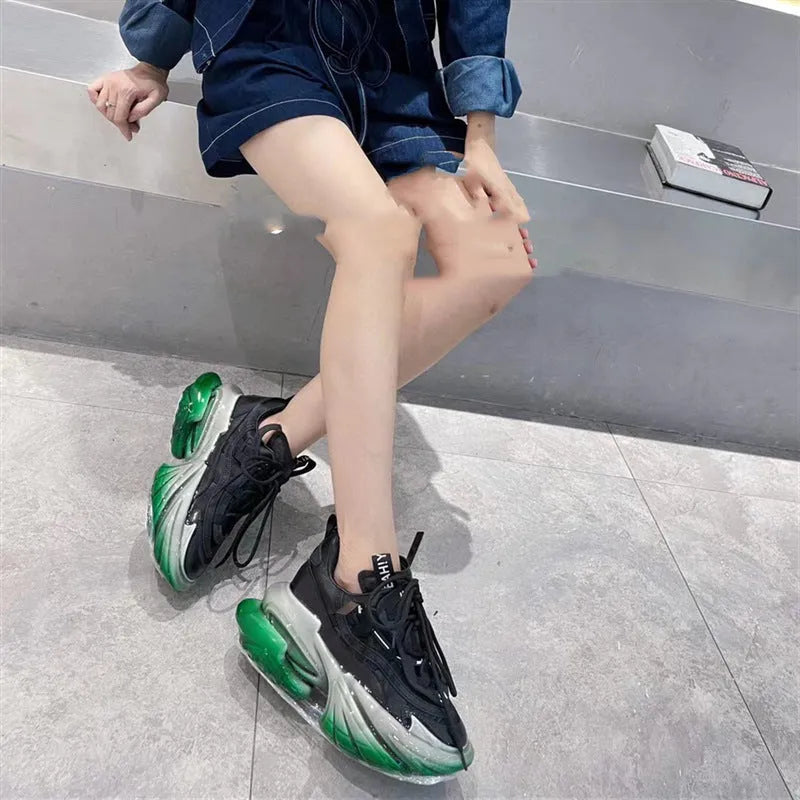 Women's leather jelly shoes with thick sole and cross-tie detail in green, blue, white, purple, or black.