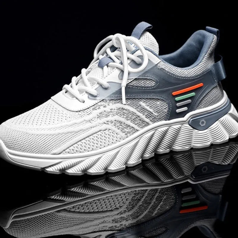 Men's white blue and black platform casual sports shoes with cross straps and mesh upper.