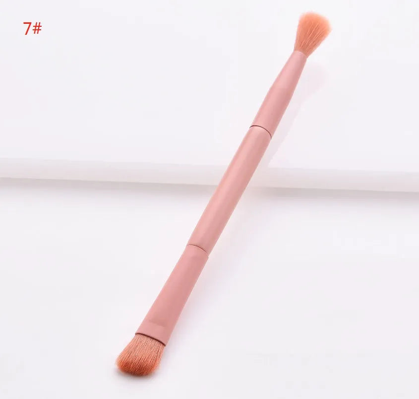 Ten-piece wooden handle makeup brush set with nylon bristles including powder, foundation, and double-ended brushes