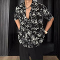 Casual printed shirt with floral pattern and loose fit in black and white colour options