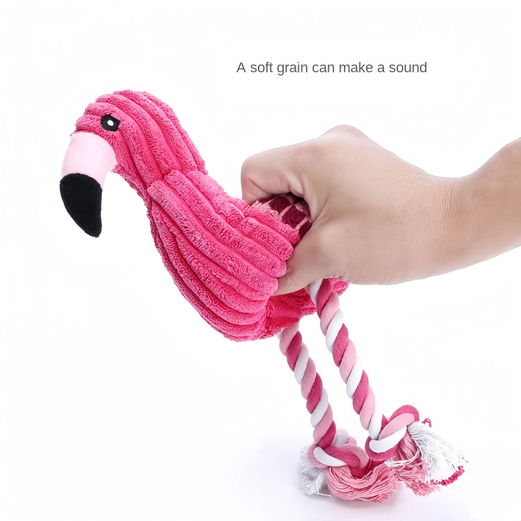 Pink corduroy plush dog toy shaped like a lion, elephant, or giraffe with a squeaker.