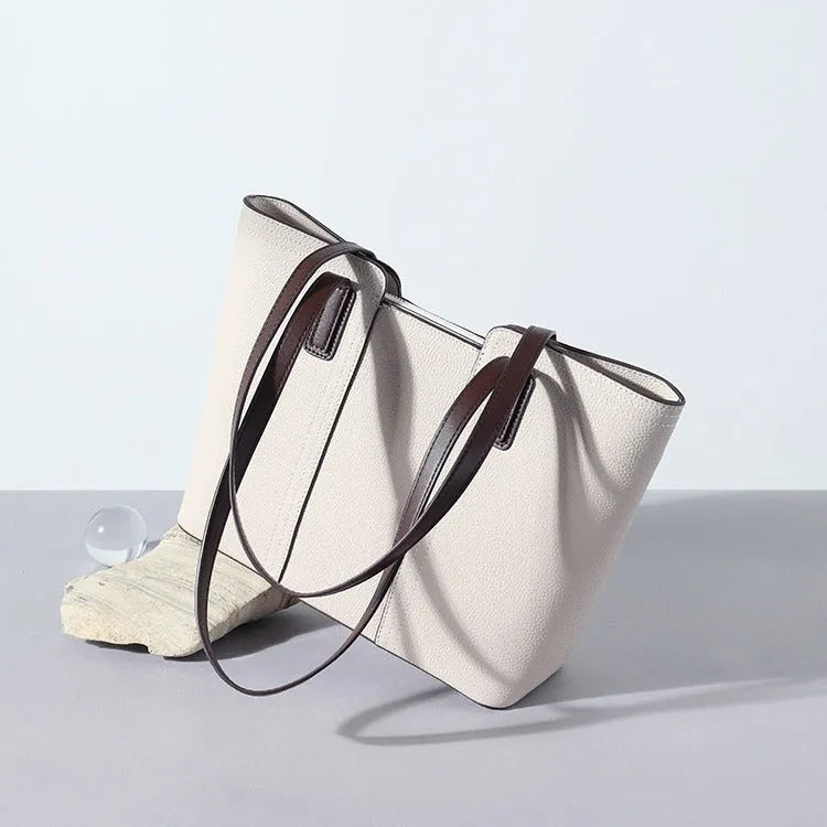Women's genuine leather shoulder bag in box-type design with mobile phone compartment, shown in multiple colour options