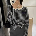 Dark grey and white striped slim fit women's cardigan with long sleeves.